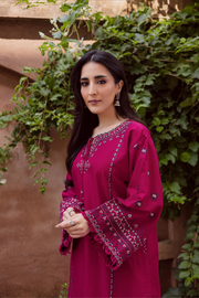 Embroidered pink khaddar shirt paired with matching culottes for festive sophistication. Affordable ethnic Pakistani South Asian.