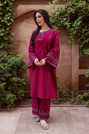 Batik embroidered khaddar outfit in rich pink tones blending traditional artistry and modern flair. Affordable ethnic Pakistani South Asian