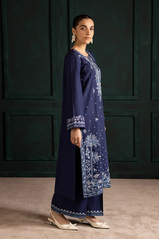 Embroidered blue khaddar ensemble by Batik showcasing refined detailing and graceful lace borders. Affordable ethnic Pakistani South Asian.