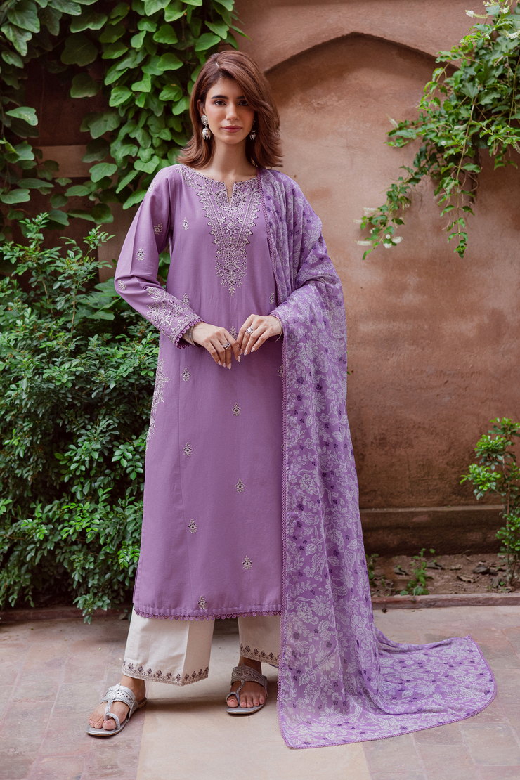 Three piece lavender khaddar set featuring an embroidered paneled shirt with crochet lace and crinkle printed dupatta. Ready to wear Pakistani South Asian.