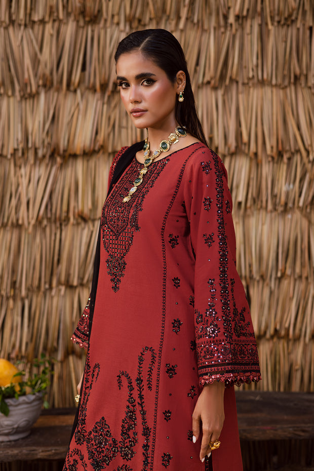Embroidered rust khaddar shirt paired with contrasting dupatta Pakistani three piece outfit for festive occasions UK