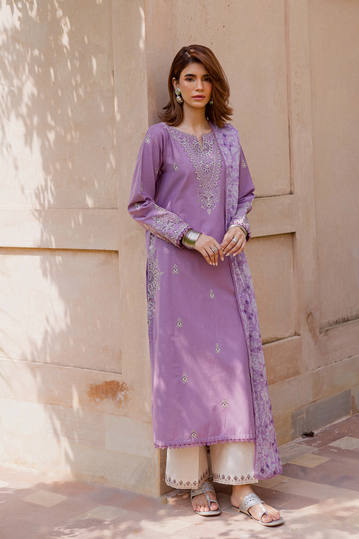 Embroidered lavender khaddar outfit paired with contrast trousers and printed dupatta. Ready to wear Pakistani South Asian.