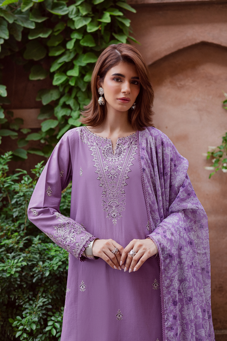 Lavender khaddar shirt adorned with delicate embroidery and lace detailing for a refined elegant look. Ready to wear Pakistani South Asian.
