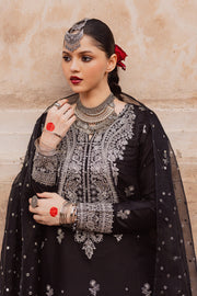 Embroidered black raw silk outfit combining refined craftsmanship with elegant festive detailing. Festive luxury Pakistani South Asian.