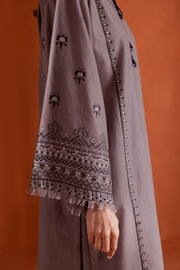 Elegant grey khaddar set blending modern design with traditional embroidery. Ready to wear Pakistani South Asian.