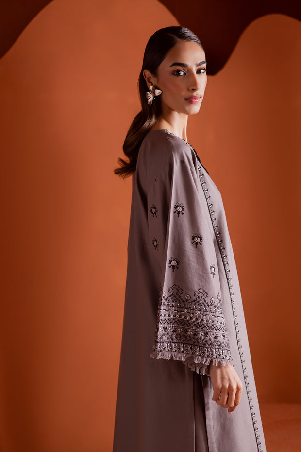 Khaddar shirt with cross stitch embroidery paired with matching embroidered culottes. Ready to wear Pakistani South Asian