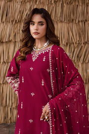 Heavily embroidered burgundy khaddar shirt with gold threadwork elegant Pakistani party outfit South Asian winter fashion UK
