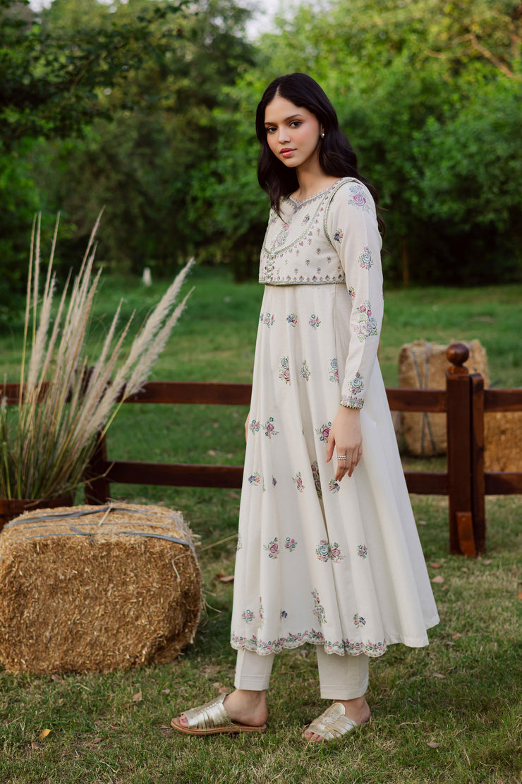 A warm winter South Asian outfit in soft khaddar, designed for Pakistani and Indian festive events, weddings, Eid gatherings and elegant everyday wear.