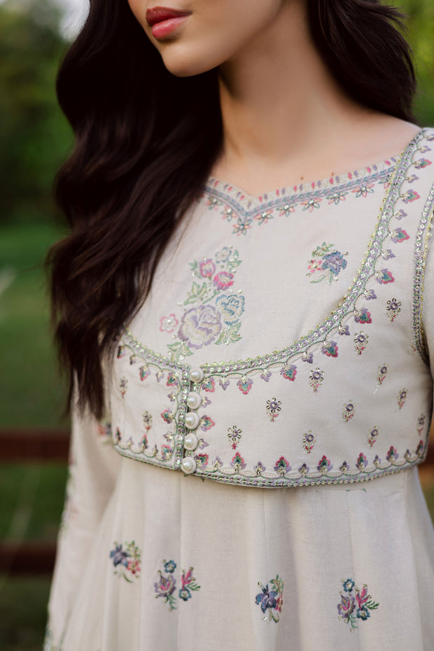 A warm winter South Asian outfit in soft khaddar, designed for Pakistani and Indian festive events, weddings, Eid gatherings and elegant everyday wear.