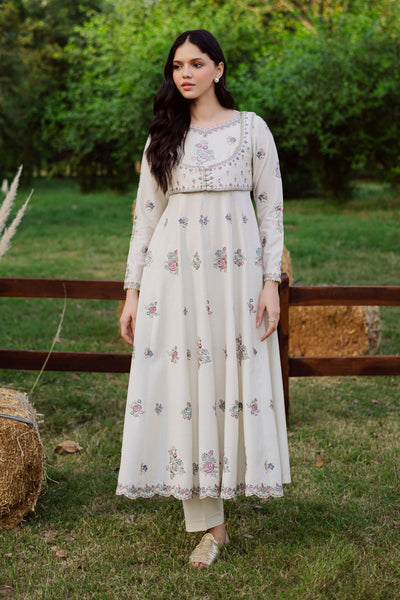 A warm winter South Asian outfit in soft khaddar, designed for Pakistani and Indian festive events, weddings, Eid gatherings and elegant everyday wear.