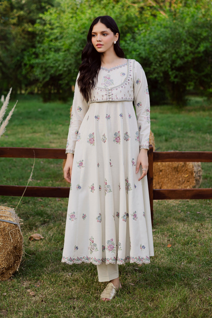 A warm winter South Asian outfit in soft khaddar, designed for Pakistani and Indian festive events, weddings, Eid gatherings and elegant everyday wear.