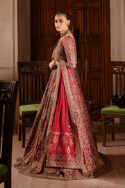 Side angle capturing Azrina’s detailed dupatta borders and matching pearl-embellished pouch potli bag Bridal luxury Pakistani South Asian India