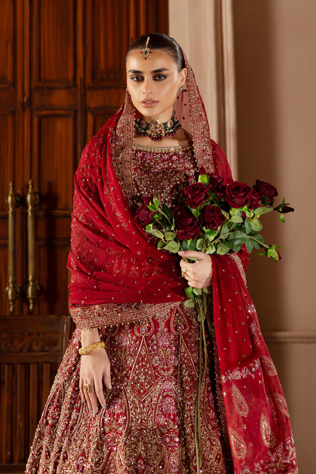Full-length Azrina ensemble showcasing a voluminous Korean raw silk lehnga with intricate floral and geometric motifs. Bridal luxury Pakistani South Asian Indian affordable