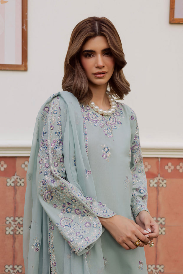 A warm winter South Asian outfit in soft khaddar, designed for Pakistani and Indian festive events, weddings, Eid gatherings and elegant everyday wear.