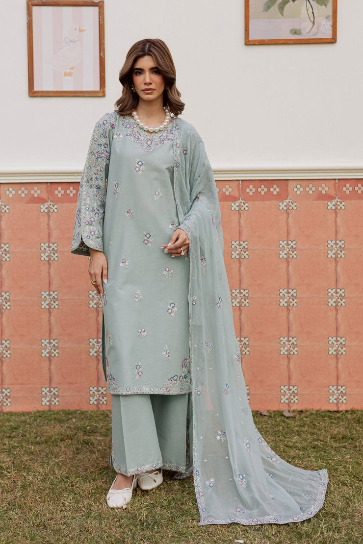 A warm winter South Asian outfit in soft khaddar, designed for Pakistani and Indian festive events, weddings, Eid gatherings and elegant everyday wear.