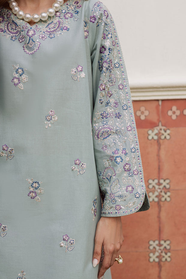 A warm winter South Asian outfit in soft khaddar, designed for Pakistani and Indian festive events, weddings, Eid gatherings and elegant everyday wear.