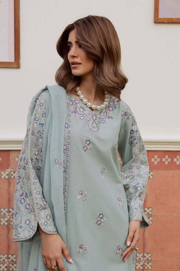 A warm winter South Asian outfit in soft khaddar, designed for Pakistani and Indian festive events, weddings, Eid gatherings and elegant everyday wear.
