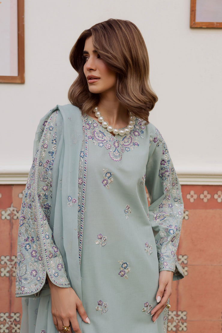A warm winter South Asian outfit in soft khaddar, designed for Pakistani and Indian festive events, weddings, Eid gatherings and elegant everyday wear.