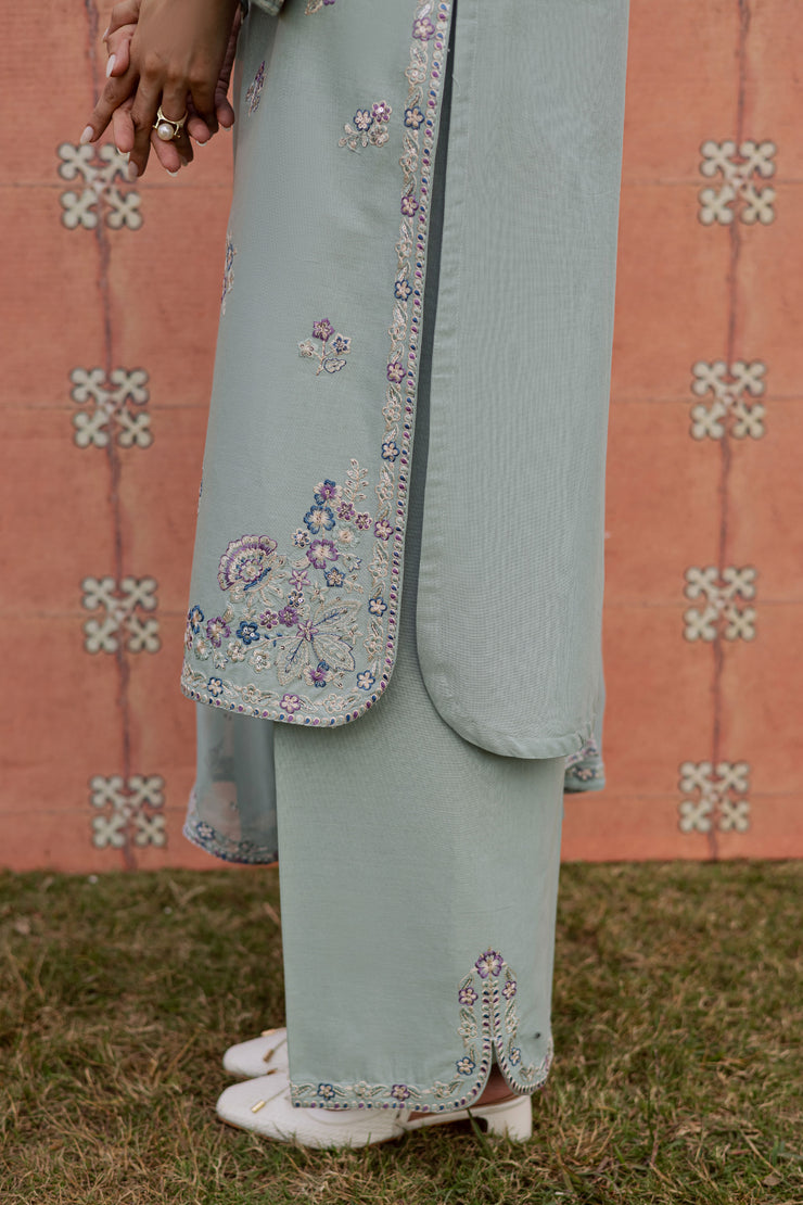 A warm winter South Asian outfit in soft khaddar, designed for Pakistani and Indian festive events, weddings, Eid gatherings and elegant everyday wear.