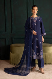 Dusky three piece khaddar set featuring a long embroidered blue shirt with matching trousers and dupatta. Ready to wear Pakistani South Asian