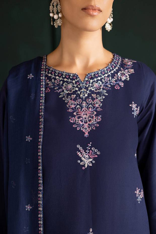 Detailed shot of embroidered sleeve and dupatta border showcasing fine craftsmanship. Ready to wear Pakistani South Asian.
