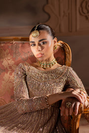 Close-up of bridal neckline and sleeves with heavy adda embellishments and delicate beadwork, reflecting fine craftsmanship. Bridal luxury Pakistani South Asian Ind