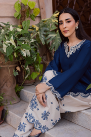 Blue embroidered khaddar shirt paired with contrasting fully embroidered shalwar. Ready to wear Pakistani South Asian.